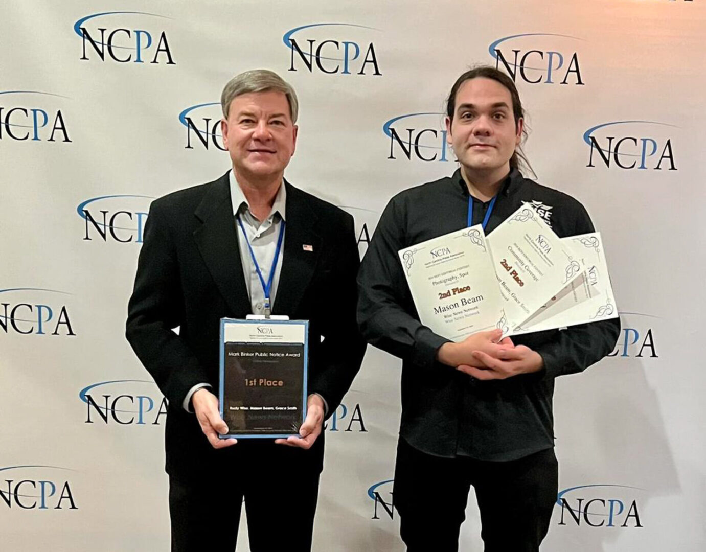 Rusty Wise and Mason Beam after receiving rewards by the NCPA.