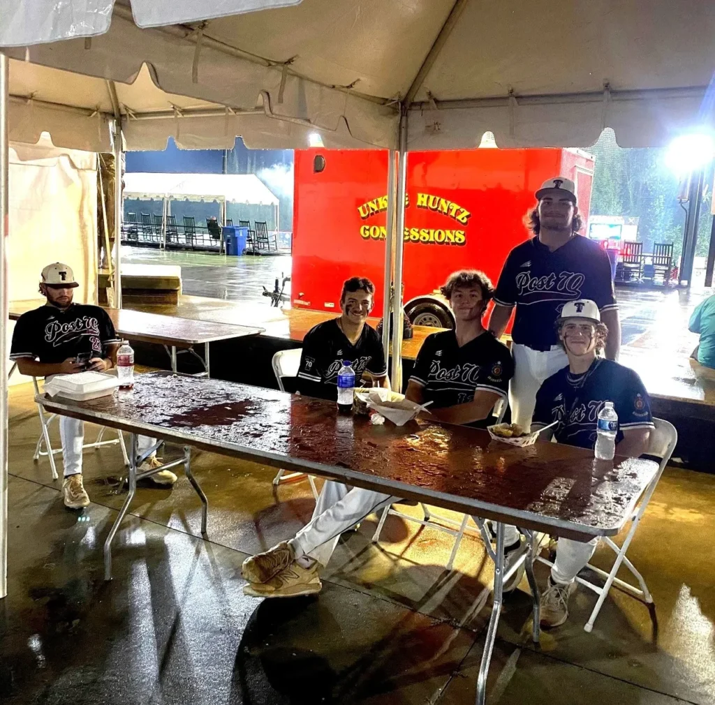 Baseball players relaxing from Post 70.